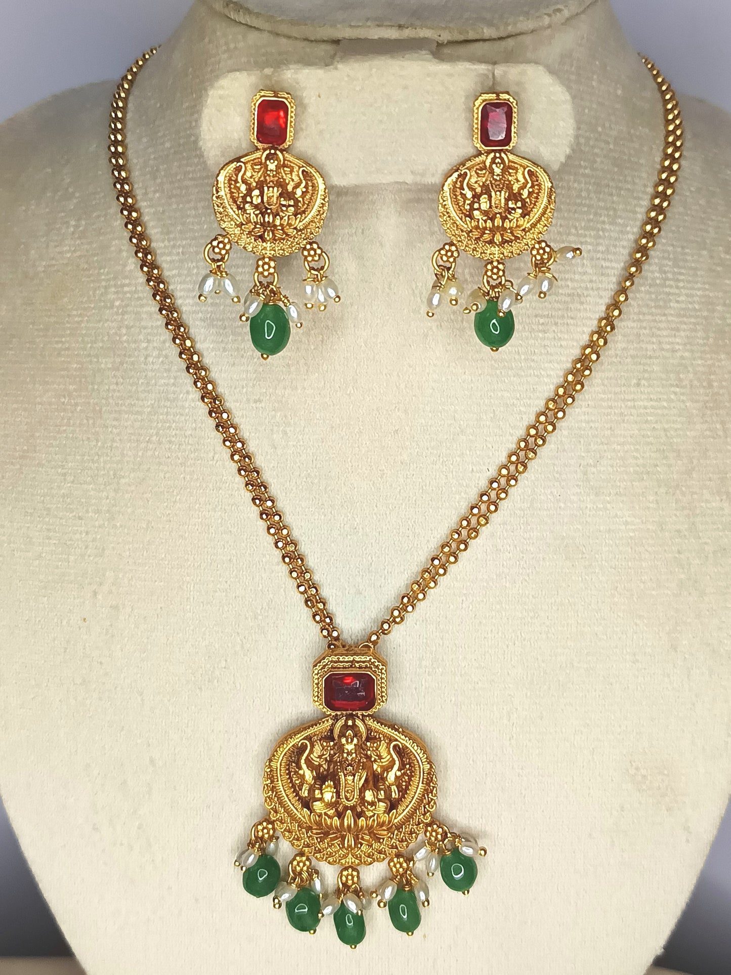 Gold Chain with lakshmi pendent and ruby and Emerlad
