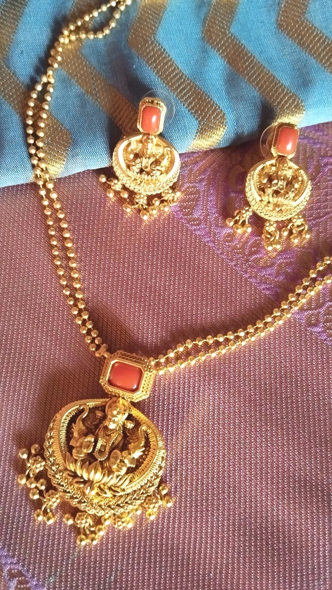 Gold Chain with coral beaded lakshmi pendent