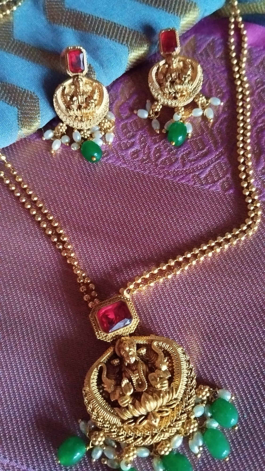 Gold Chain with lakshmi pendent and ruby and Emerlad