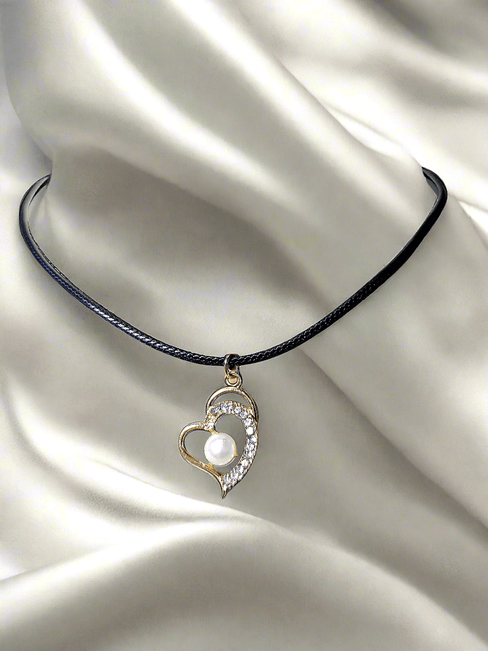 Elegant gold pendent on black nylon chain. trendy fahionable for ollege, office and kids