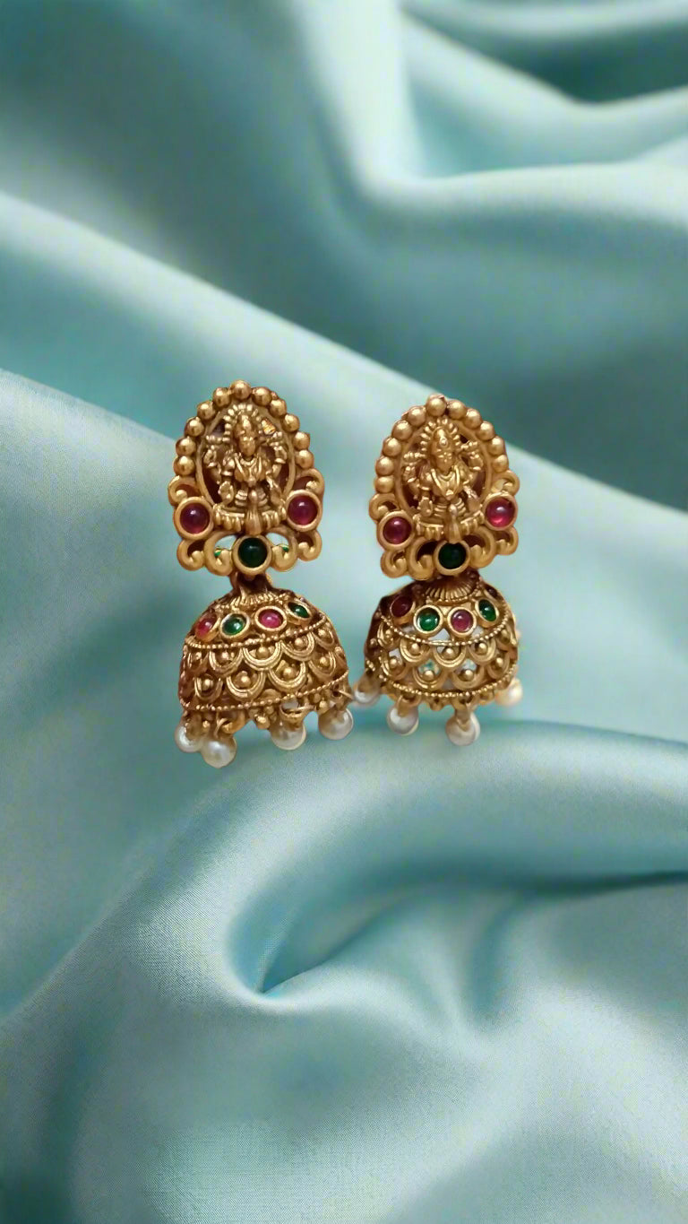 Antique lakshmi haram set with Rama blue crystal beads
Temple jewelry online
Gold temple jewelry
Bridal temple jewelry
Traditional temple jewelry
South Indian temple jewelry
Handcrafted temple jewelry
Temple jewelry for weddings
Goddess Lakshmi temple jewelry set
Antique temple necklace with earrings
