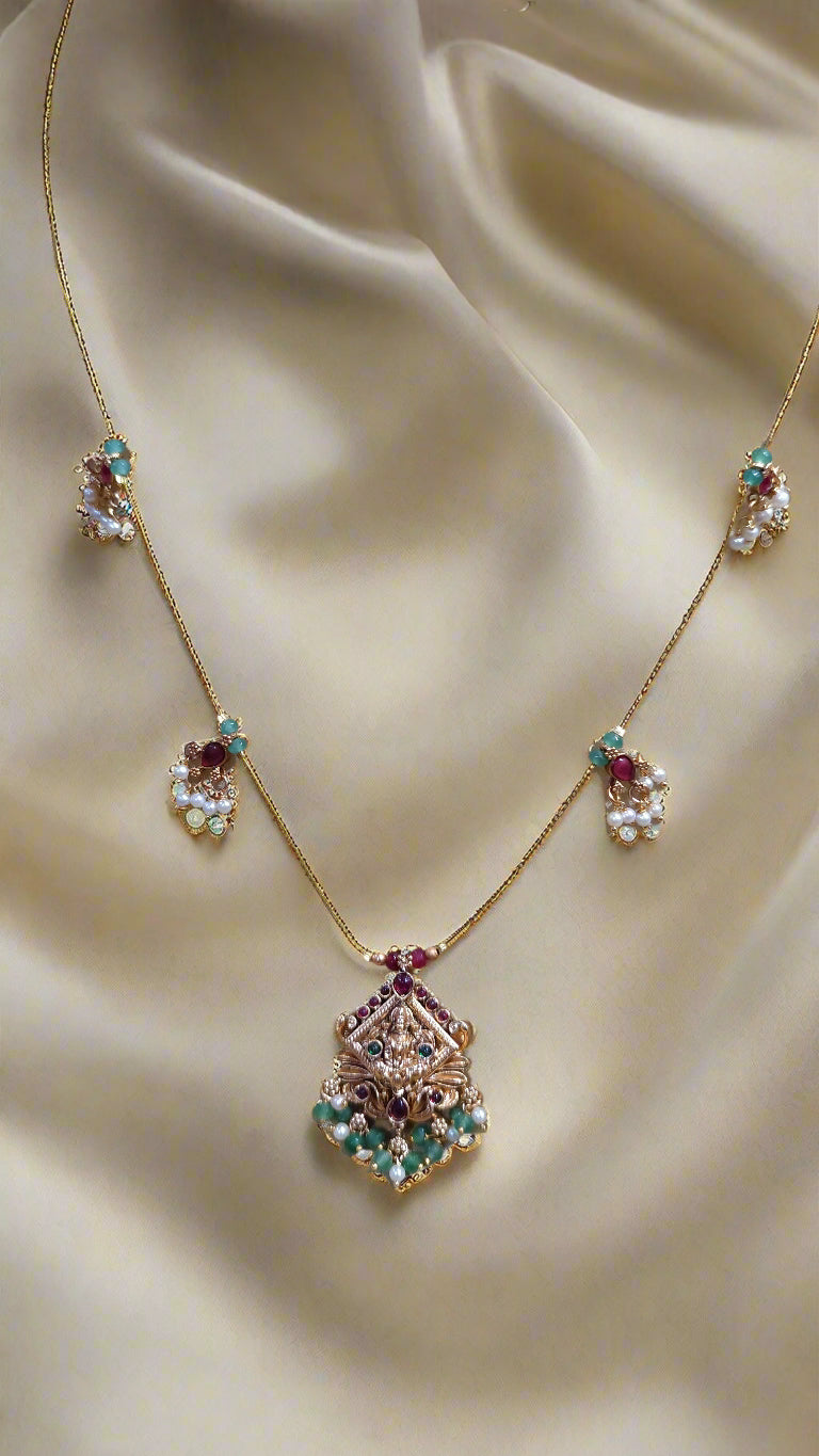 Invisible Gold Chain with pendent and ruby and Emerlad with pearls